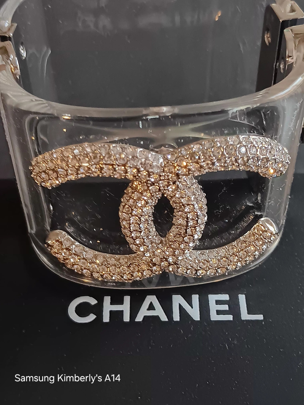This is an authentic CHANEL Lucite Baguette Crystal CC Cuff in Transparent.